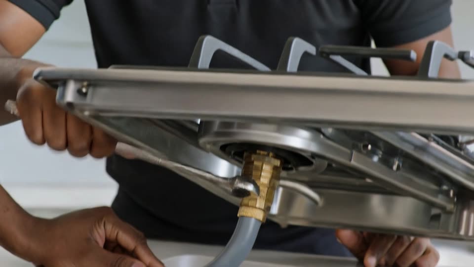 Gas Installers Pretoria - LPG gas hob connection being made by a registered gas installer